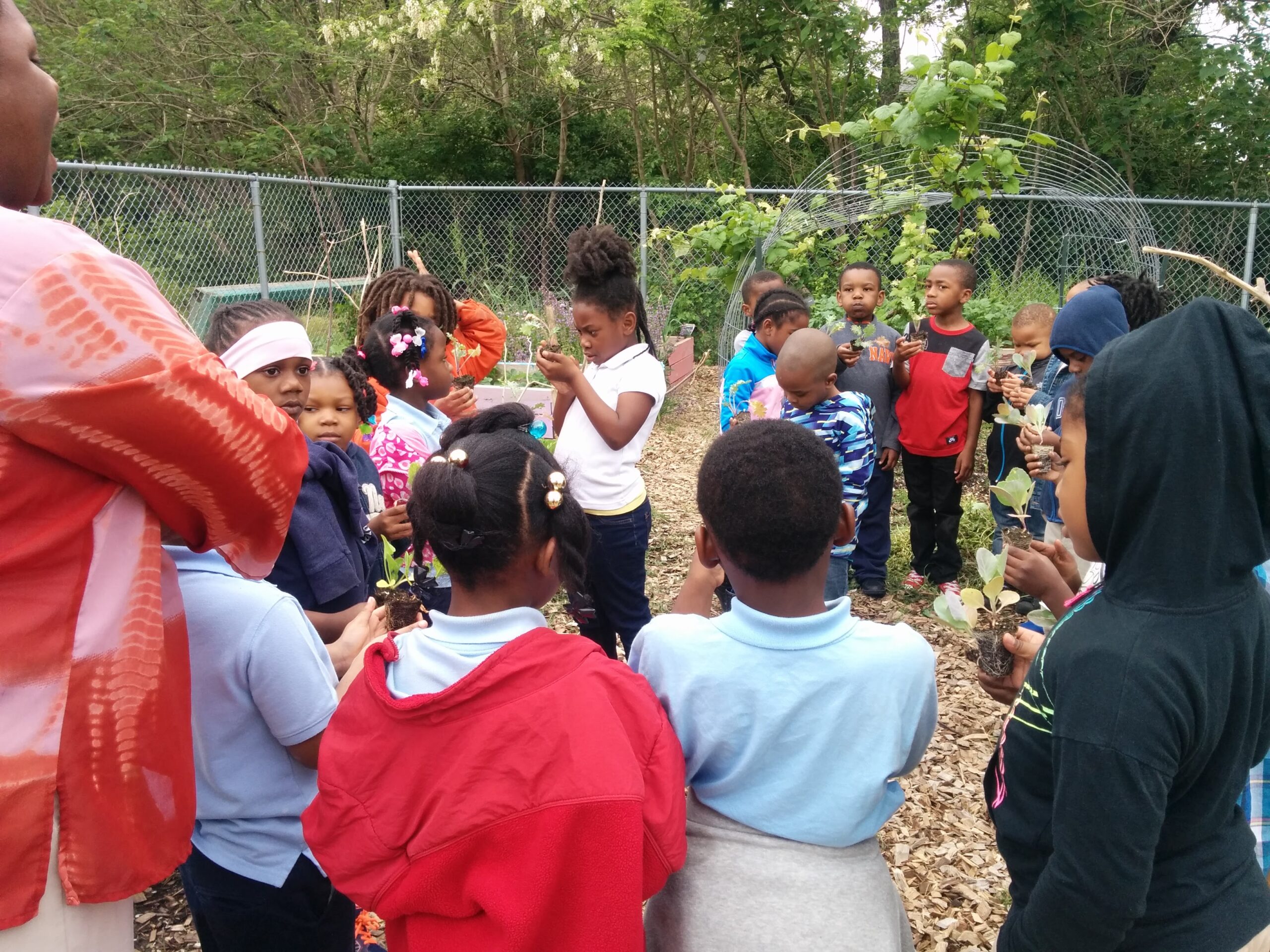Nina Warren with students in Clay Elementary School Garden 01
